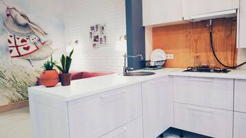Apartment | Private kitchenette | Full-sized fridge, oven, stovetop, electric kettle