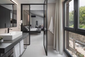 Deluxe Studio Suite (King) | Bathroom | Shower, free toiletries, hair dryer, slippers - Terra Residence (Labin)