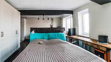 Apartament | 1 dormitori, planxa i posts de planxar i roba de llit