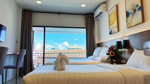 Superior Triple Room, Multiple Beds | Premium bedding, down duvets, pillow-top beds, in-room safe