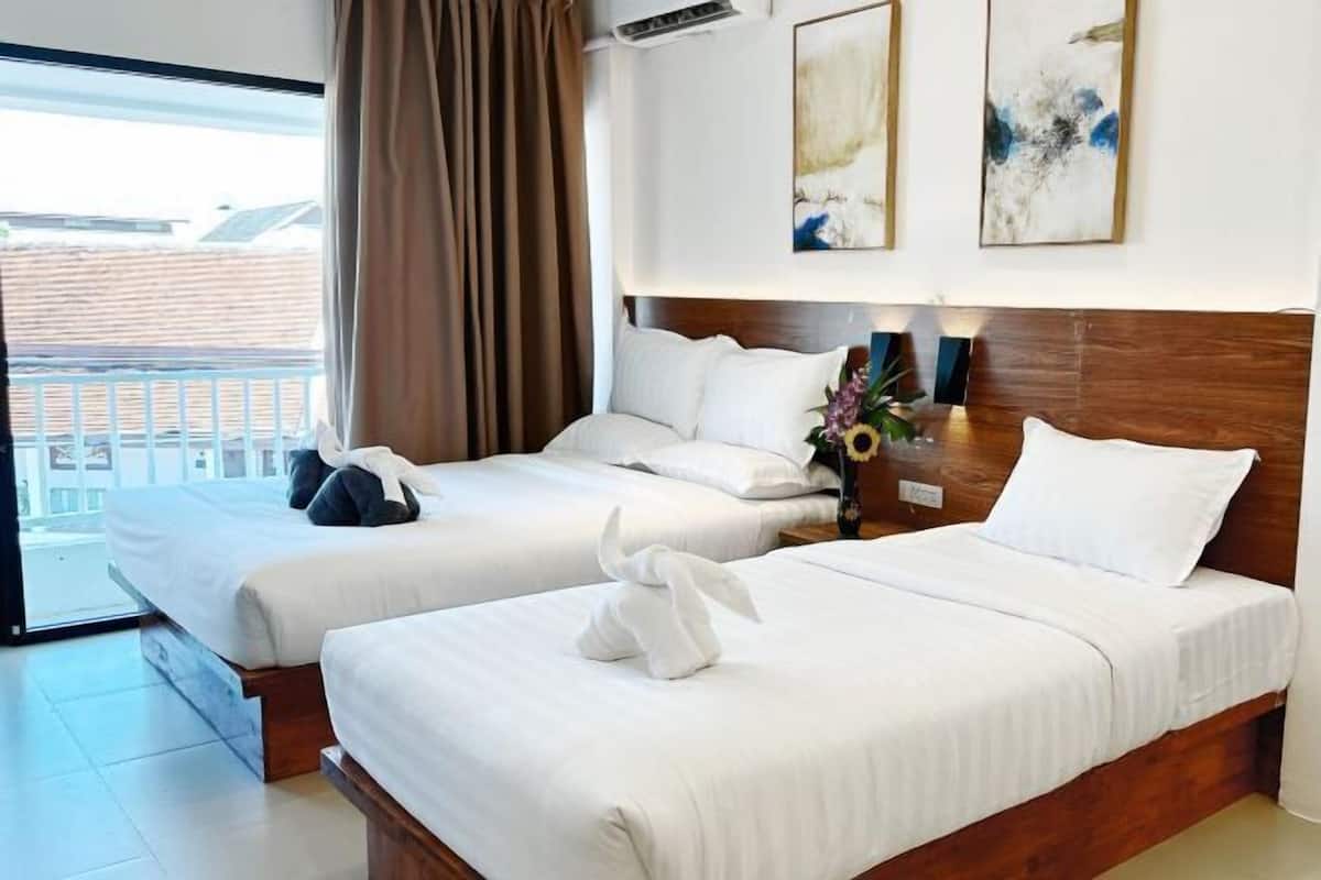 Premium bedding, down comforters, pillowtop beds, in-room safe