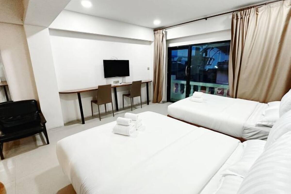 Premium bedding, down comforters, pillowtop beds, in-room safe