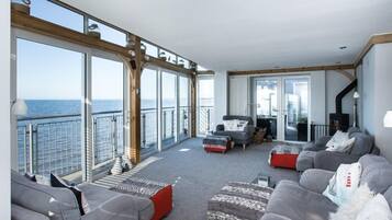 Luxury Apartment | Living area | Flat-screen TV