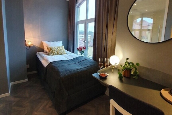 Habitación individual | Cortinas opacas, tabla de planchar con plancha, wifi gratis