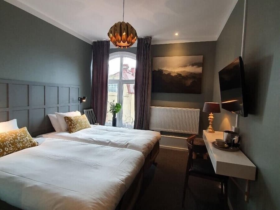 Double Room | Blackout drapes, iron/ironing board, free WiFi, bed sheets