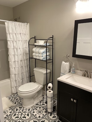 Hair dryer, towels, soap, shampoo
