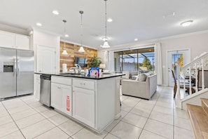 Spacious kitchen ready for meals. - Theme Rooms! 5BR Townhouse w Pool in Kissimmee (Kissimmee)