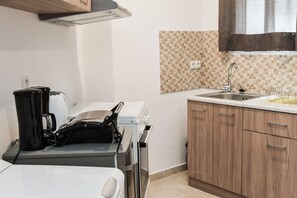 Apartment | Private kitchenette | Fridge, oven, stovetop, coffee/tea maker - Central studio at Plateia Amerikis 1bed 2pers  (Athens)