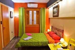 1 habitación, sistema de insonorización y tabla de planchar con plancha 