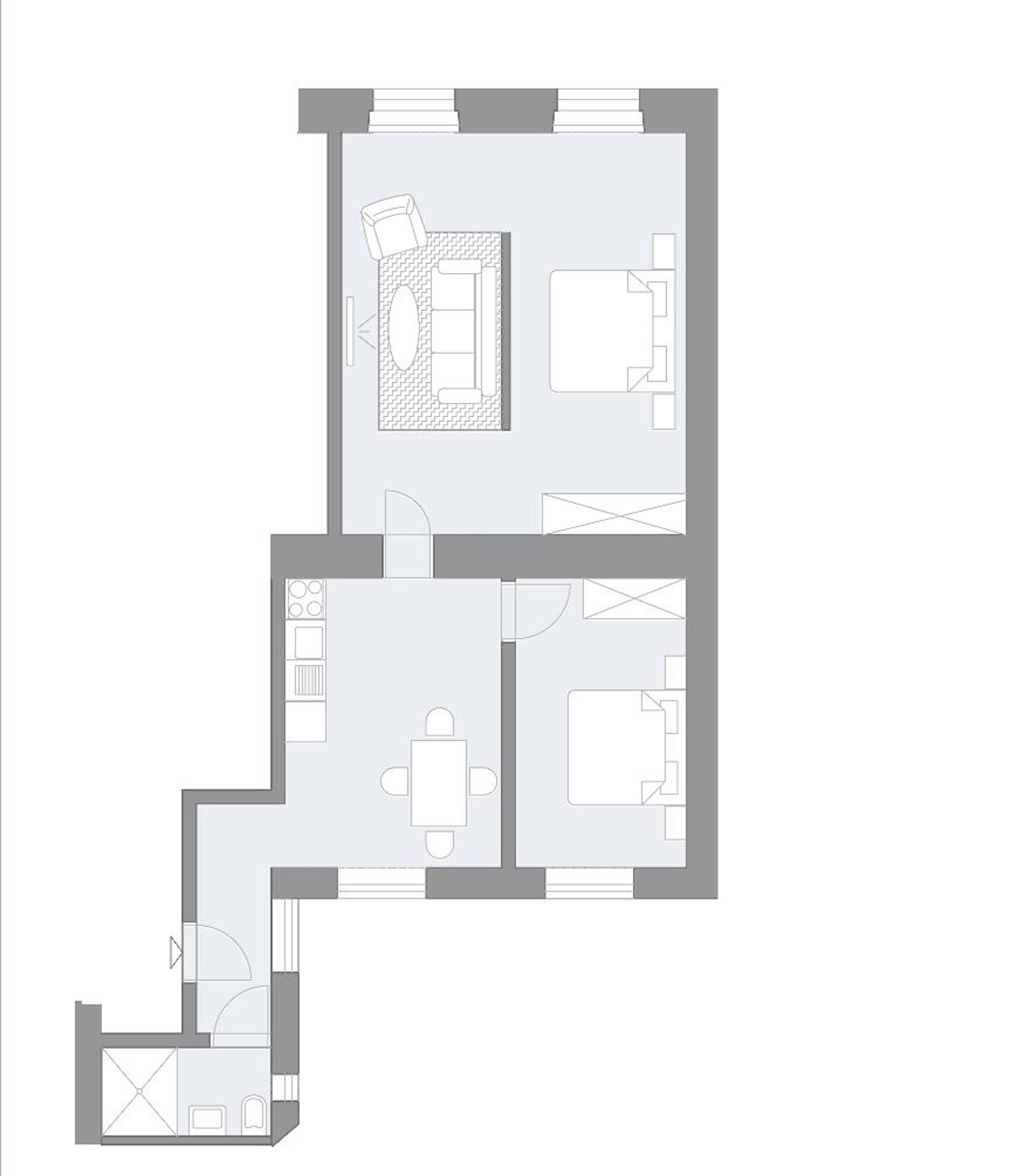 Planta baixa de um quarto de hotel com banheiro, quarto, sala de estar e sala de jantar.