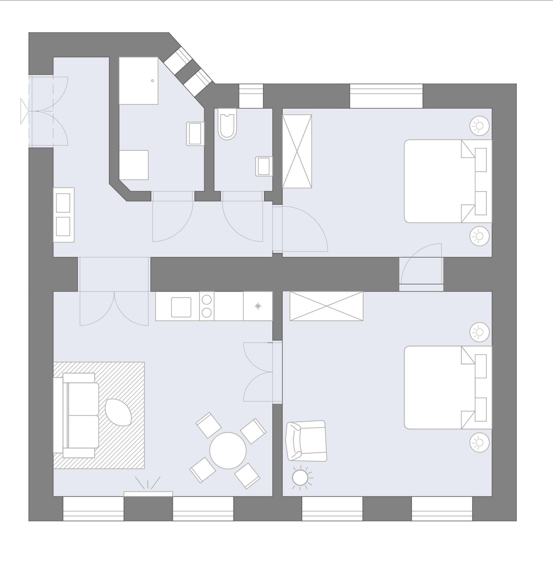 Un plan d’étage d’hôtel comprenant un couloir central, plusieurs chambres, un espace repas et une cuisine.