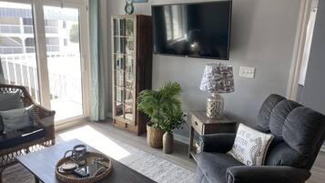 Condo, 2 Bedrooms, Balcony, Partial Ocean View (4307) | Living area | 50-inch Smart TV with cable channels, TV