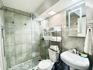 Condo, 1 Bedroom, Balcony (204A) | Bathroom | Combined shower/tub, towels