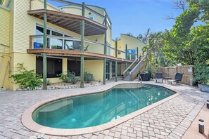 Outdoor pool, a heated pool - spectacular architectural home steps to the beach w/private heated pool on canal (Fort Myers Beach)