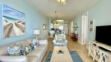 Condo, 2 Bedrooms, Balcony, Beachfront (P403) | Living area | Flat-screen TV, DVD player