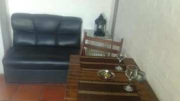 Standard Apartment | Living area | 32-inch flat-screen TV with satellite channels, TV