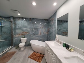 Bathtub, hair dryer, towels