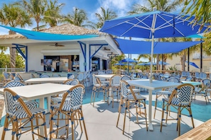 Outdoor dining - OV 625 Pond/Bridge View Condo-Paradise Vacation Rental in Ocean Village (Fort Pierce)