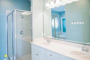 Combined shower/tub, jetted tub