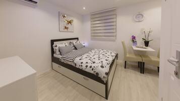 Apartment, 1 Bedroom | 1 bedroom, minibar, desk, soundproofing