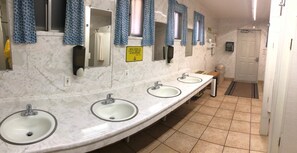 Basic Cabin, Multiple Beds, Shared Bathroom | Bathroom | Combined shower/bathtub, free toiletries, hair dryer, towels - Silver City KOA (Silver City)