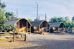 Basic Cabin, Multiple Beds, Shared Bathroom | Pillow-top beds, individually decorated, individually furnished - Silver City KOA (Silver City)