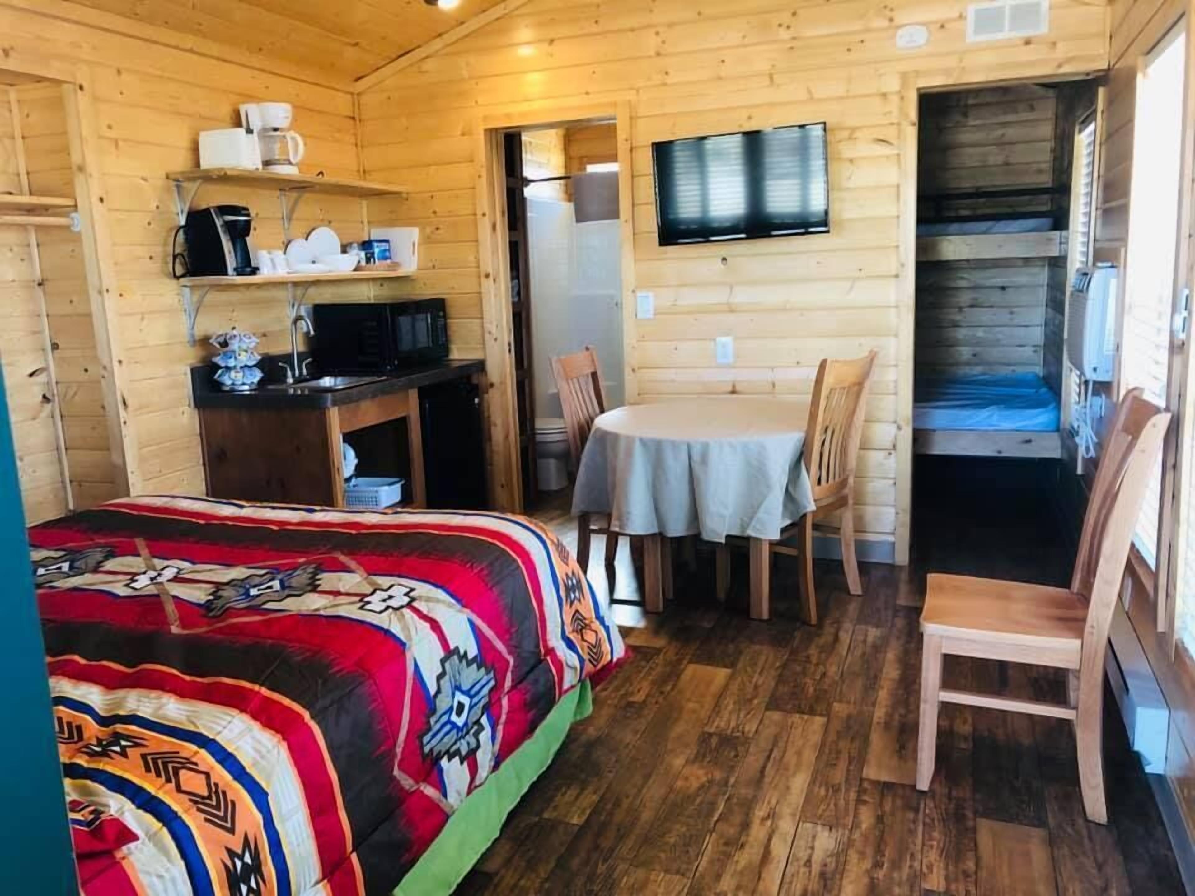 Deluxe Cabin, Patio | Pillow-top beds, individually decorated, individually furnished