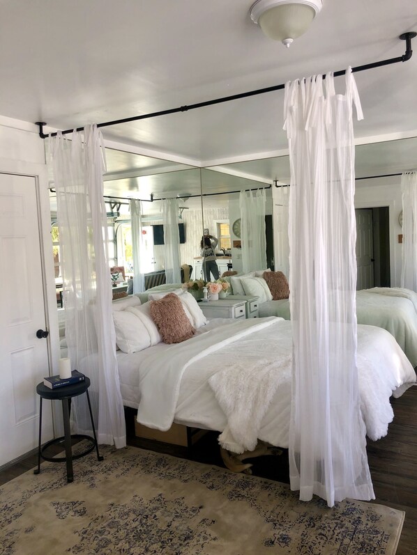 Memory-foam beds, blackout curtains, iron/ironing board, free WiFi