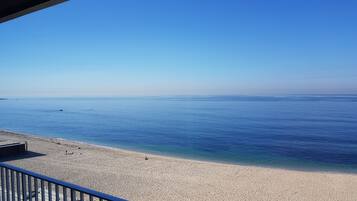 On the beach, sun loungers
