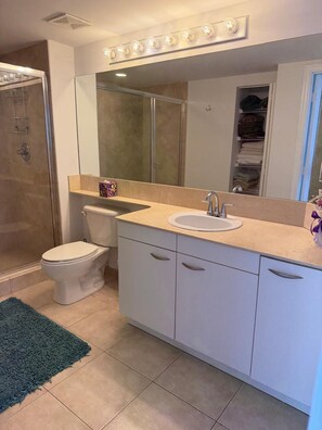 Shower, hair dryer, towels, soap