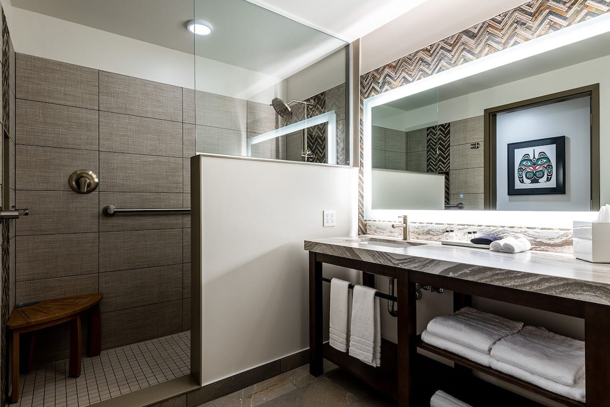 deluxe double room | bathroom | shower, designer toiletries, hair dryer, bathrobes