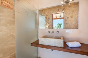Bathtub, hair dryer, towels