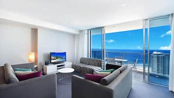 Superior Apartment | Living area | Flat-screen TV