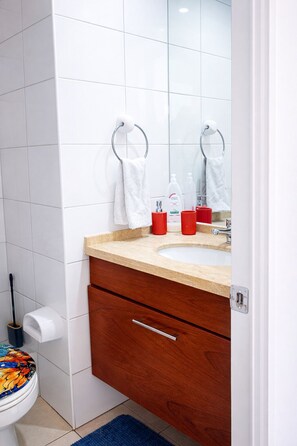 Hair dryer, towels, soap, shampoo