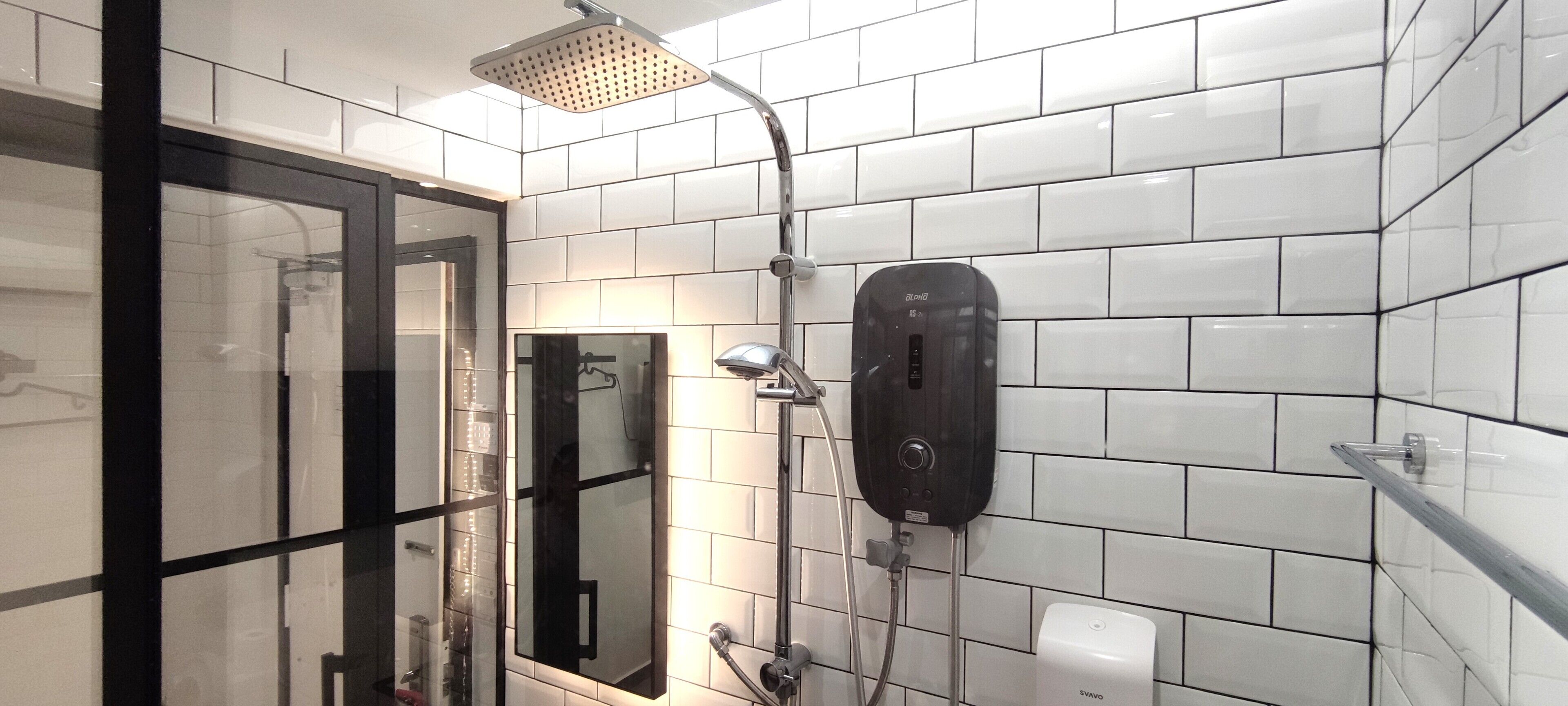 superior single room | bathroom | shower, rainfall showerhead, free toiletries, hair dryer