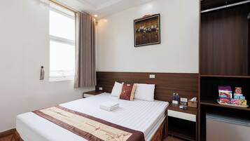 Quarto casal standard | Frigobar, escrivaninha, Wi-Fi de cortesia