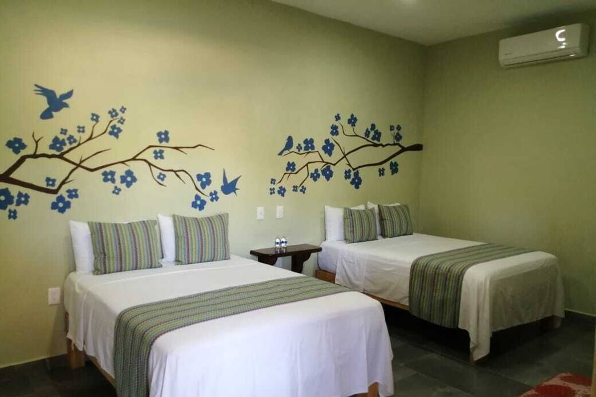 City Room, 2 Double Beds, Private Bathroom | Blackout drapes, iron/ironing board (on request), WiFi (free)
