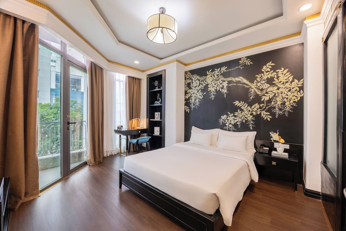 Deluxe Double Room, City View | Minibar, in-room safe, blackout curtains, iron/ironing board