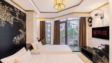 Deluxe Room, 2 Twin Beds, City View | Minibar, in-room safe, blackout drapes, iron/ironing board