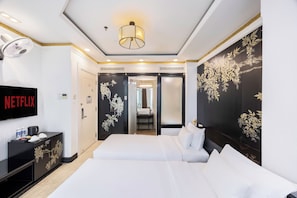 Deluxe Room, 2 Twin Beds, City View | Minibar, in-room safe, blackout drapes, iron/ironing board