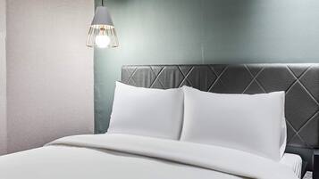 Down comforters, free minibar, desk, blackout drapes