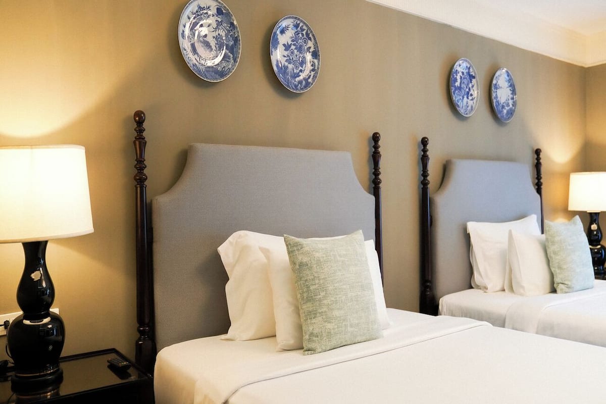 Deluxe Twin Room | In-room safe, individually decorated, desk, laptop workspace