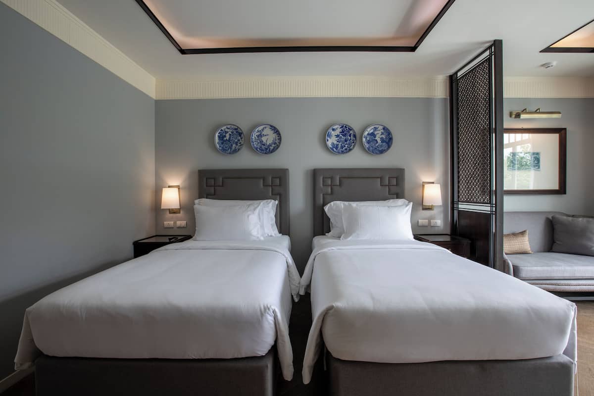 Deluxe Twin Room | In-room safe, individually decorated, desk, laptop workspace