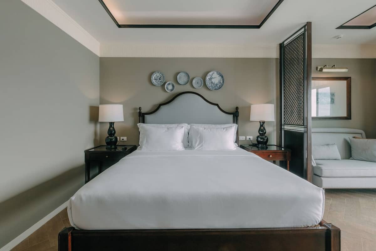 Deluxe Room with Pool View | In-room safe, individually decorated, desk, laptop workspace