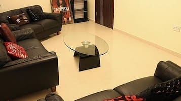 Habitación Grand | Espacio para trabajar con laptop, wifi gratis y ropa de cama