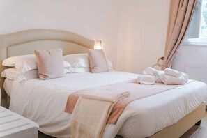 Familie studio | Italiaanse Frette-lakens, luxe beddengoed, donzen dekbedden