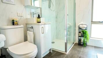 Shower, hair dryer, towels, soap