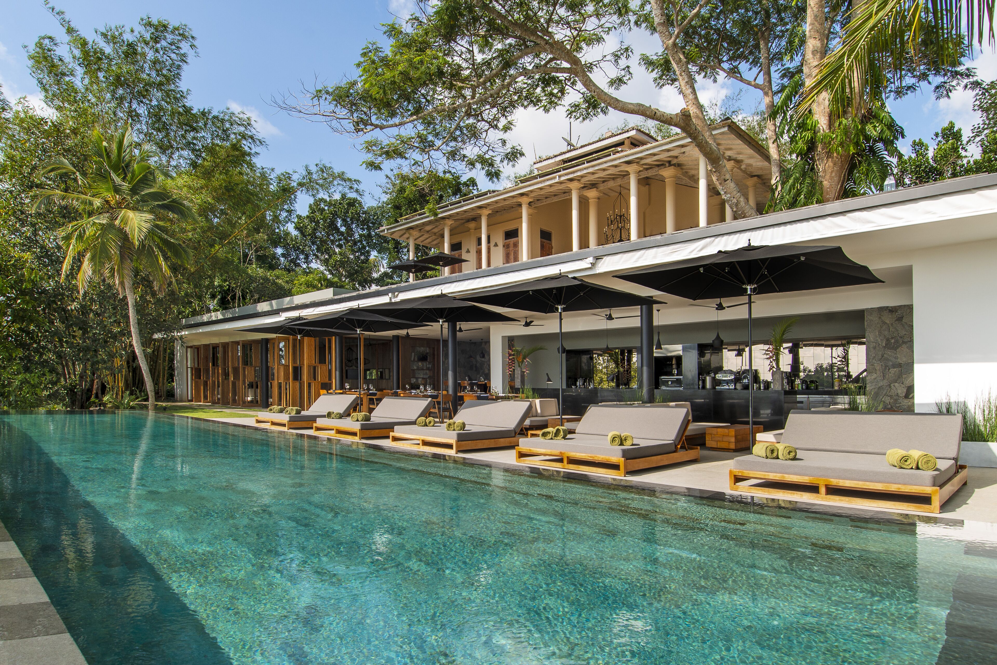 Outdoor pool, pool umbrellas, sun loungers