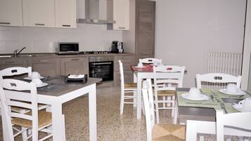 Comfort Apartment | Breakfast area | Daily cooked-to-order breakfast (EUR 6 per person)