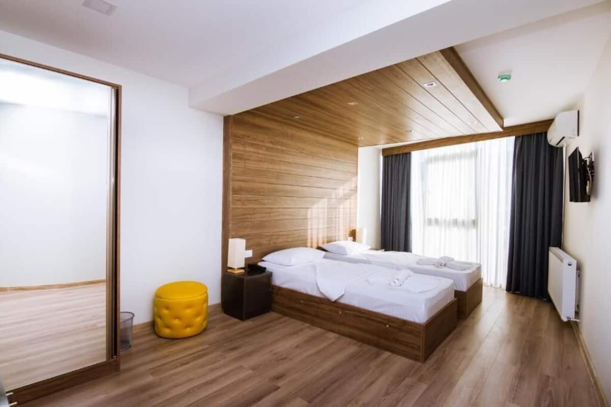 Ropa de cama de alta calidad y minibar